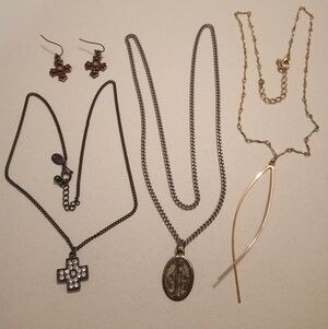 #732.  4 Piece Assorted Religious, Cross, Pendant Necklace And Earrings Bundle